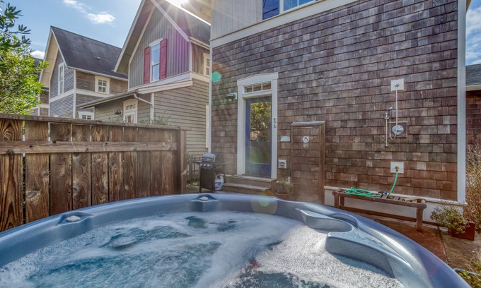 Olivia Beach House | Parkside Home, 2 Blocks to Beach, with Kids Game Room, Hot Tub and Master Suite!