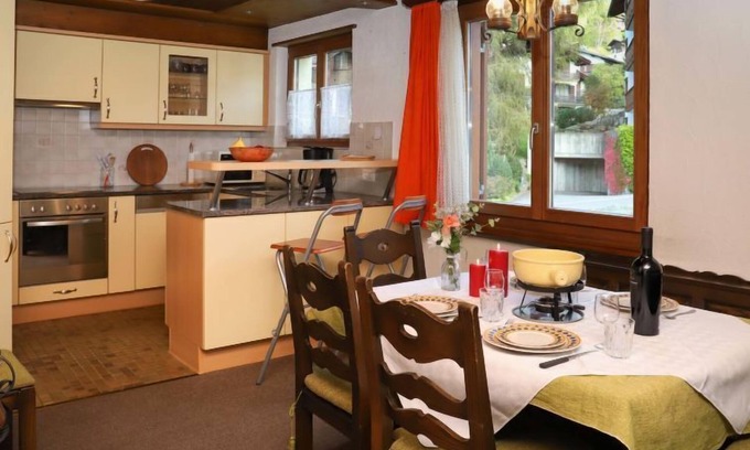 Klosters Dorf Apartment | Parnier by Interhome