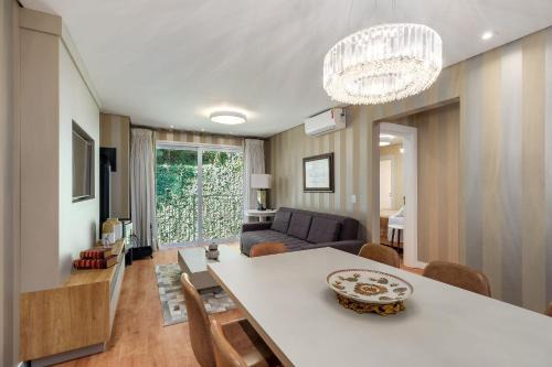 Vila Suica Apartment | Parque das Orquídeas 2 dorm by Achei Gramado