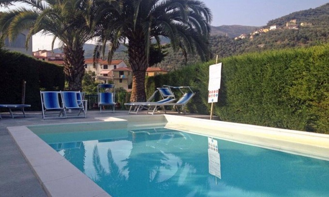 Strada Nazionale Sud House | Part of a villa with pool.