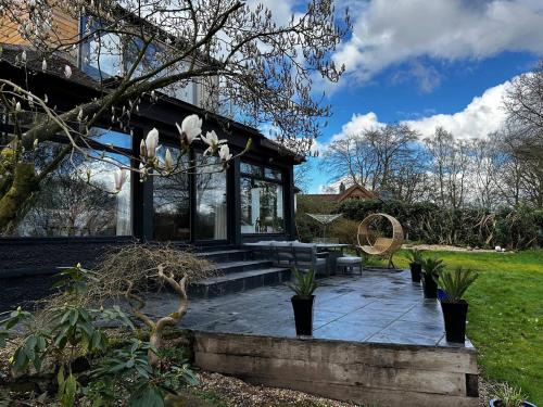 Sugnall House | Pass the Keys Acorn Lodge · Luxury Retreat In a Stunning Oasis With Hot Tub