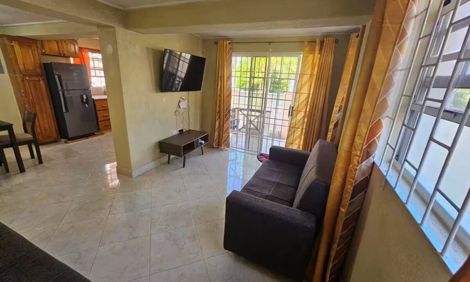 Charnocks Apartment | Peaceful 2-bedroom downstairs apartment walking distance to the airport.