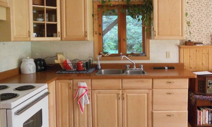 Courtenay Apartment | Peaceful, comfortable getaway - surrounded by gardens and forest.