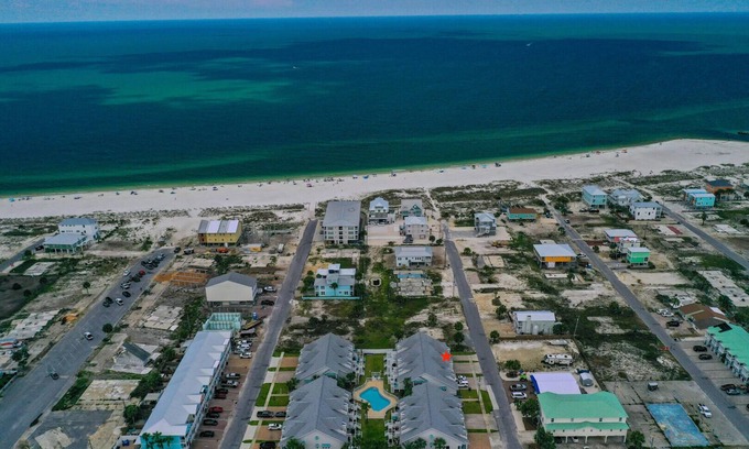Mexico Beach House | PEACEFUL EASY FEEELING OFFERS GULF VIEWS & STEPS FROM BEACH! COMMUNITY POOL!