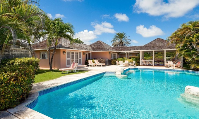 Long Bay Villa | Peaceful family getaway in tropical gardens steps away from beach. WiFi; AC; BBQ