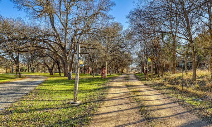 Fredericksburg Cabin | Peaceful, family-friendly cabin w/ playground, firepit, & shared hot tub!
