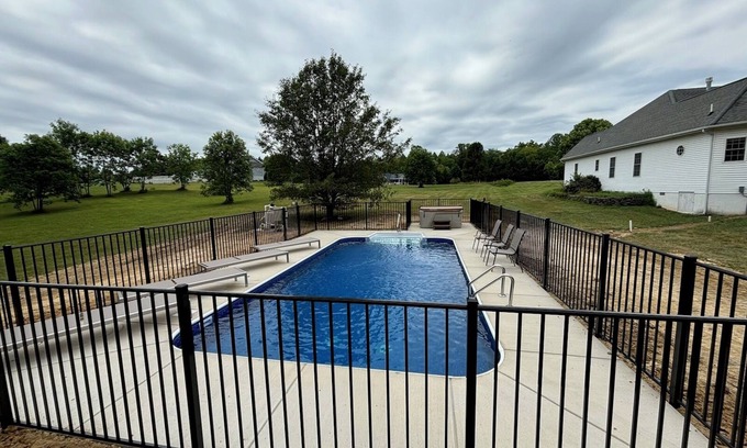 Livingston House | Peaceful, lakeside retreat-private pool, hot tub, private dock, boatslip & more!