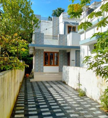 North Paravur House | Peaceful Vacation Home Near the City