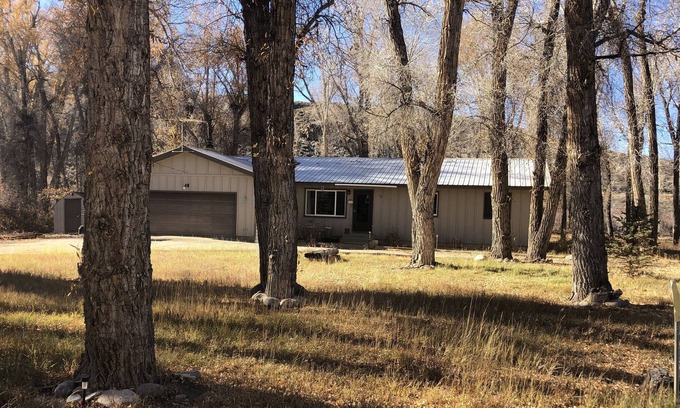 Gunnison House | Peaceful wooded retreat on 1.4 acres! River Access, Fire Pit, Dog Friendly!