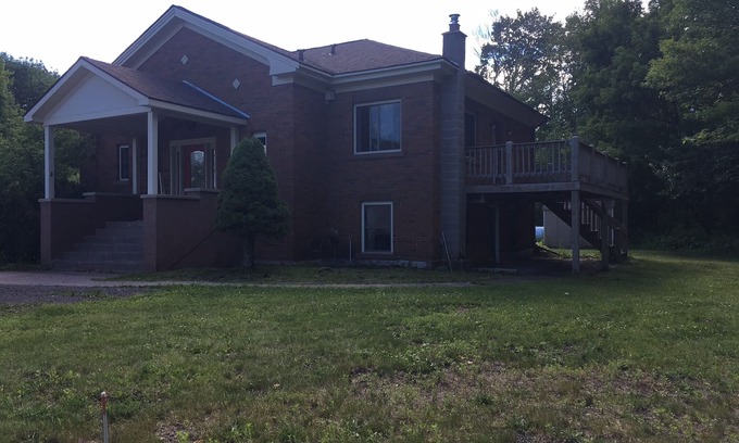 Houghton House | Peacefully Secluded With A Beautiful View Over Looking The Portage Canal