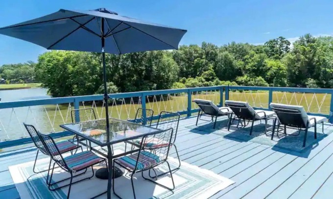 Log Cabin House | Pelican Estates Lake house at Cedar Creek Lake on wide cove in gated community.