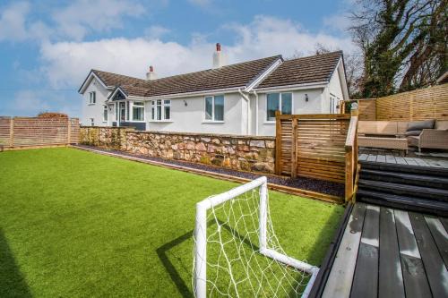 St George House | Pen y coed with hot tub and sauna surrounded by countryside views