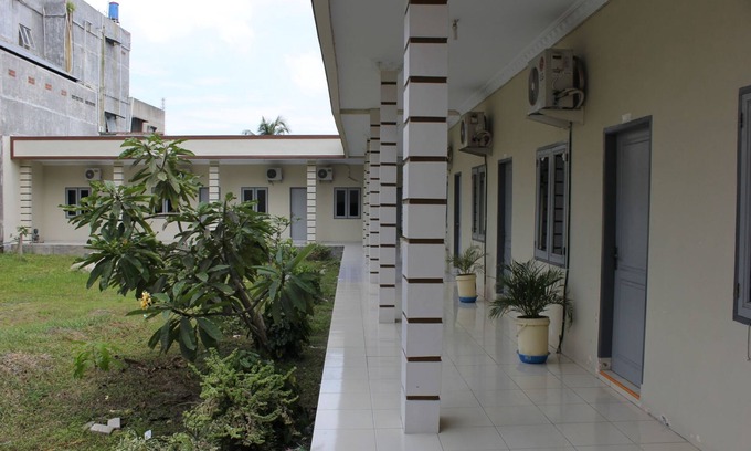 Medan House | Penginapan Transit Tomato