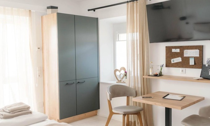 Burgau Apartment | Pension Blumenwiese - Apartment, kitchen, shower/WC, terrace, garden view