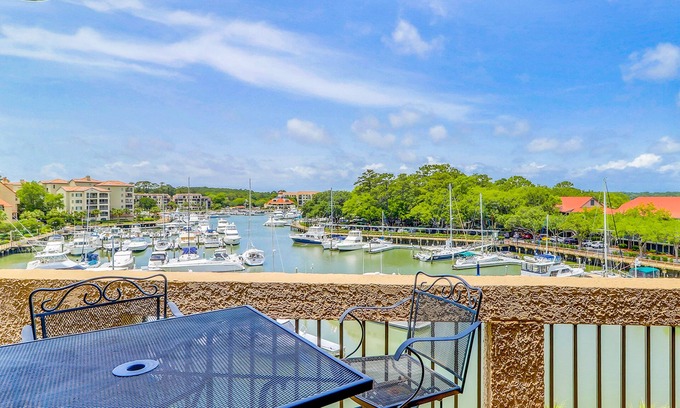 Shelter Cove Condo | Penthouse living at Shelter Cove Marina with balcony, harbor view, pool & tennis