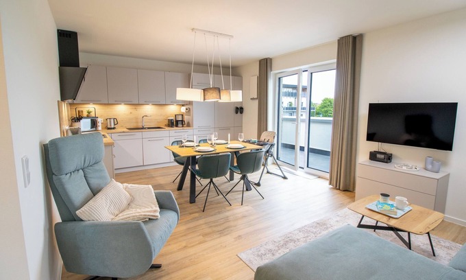 Tossens Apartment | Penthouse Lotta - view of the greenery. Stylish. Family-friendly. Quiet.