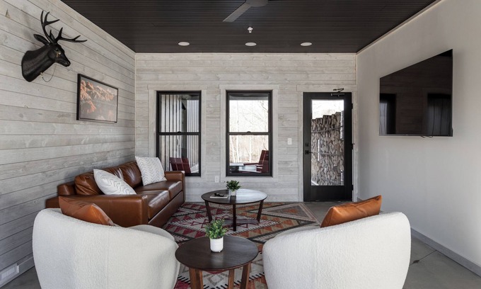 Bellaire Apartment | Pet-Friendly 2BR Family Suite in Boutique Resort w/Hot Tubs, Sauna, & Fire Pit!