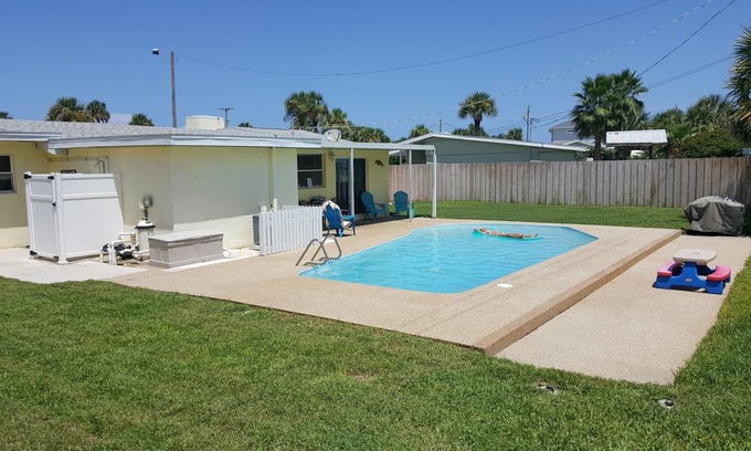 Ormond Beach Plaza House | Pet Friendly Beach House With Pool. The beach is just a 1 min walk.