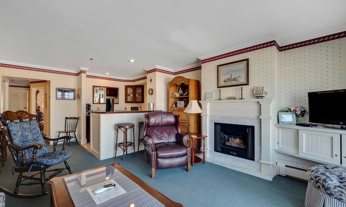 Boyne City Condo | Picture-Perfect Balcony View of Lake Charlevoix | Fireplace | Beach Access |
