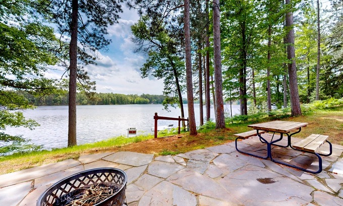 St Germain House | Picturesque Log Home with dock, fire pit, pool table, & WIFI