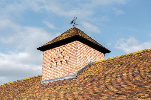 Pontesbury House | Pigeon House - Unique Barn with private garden, hot tub and wood burner