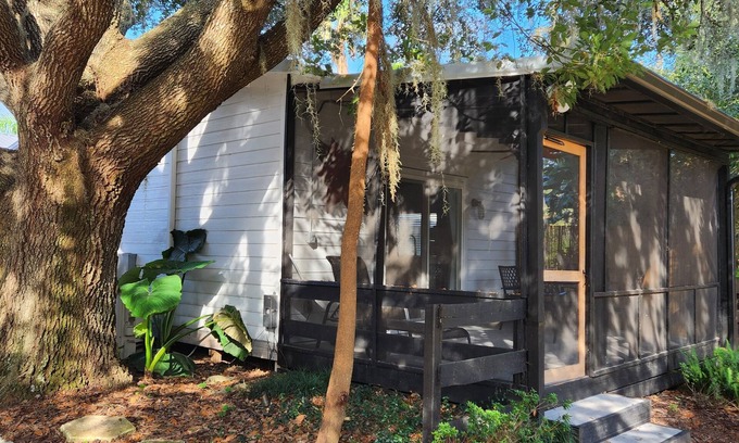Eustis Cottage | Pine Forest Studio, serene winding lane to cozy retreat.