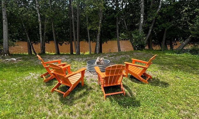 Hessel Cottage | Pine River Cottage -Savor the Summer by the River – A Waterfront Paradise!