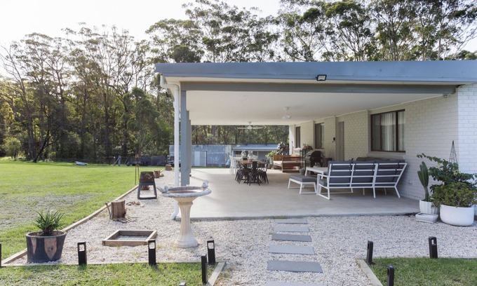 Woollamia House | Pines Escape is bright and spacious with a lovely homely feel