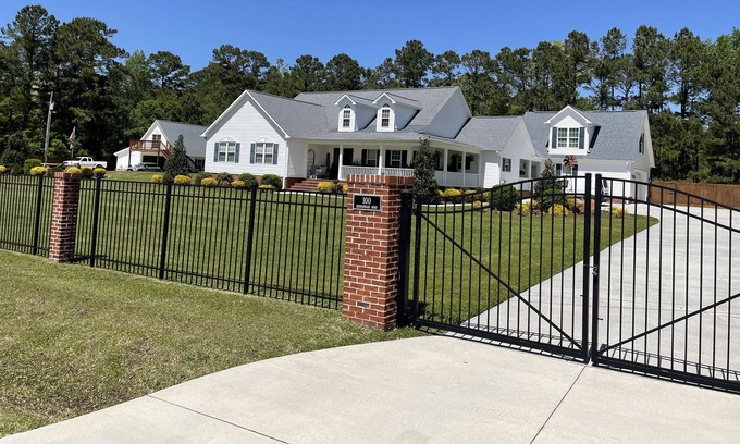 Jacksonville House | Piney Green Jacksonville NC Camp Lejeune Gated Outdoor fireplace Gameroom
