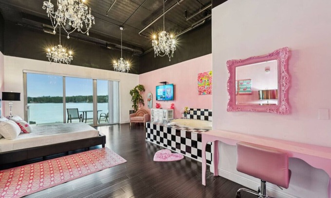 Lake Delton Condo | Pink Beachfront Condo at Delton Grand