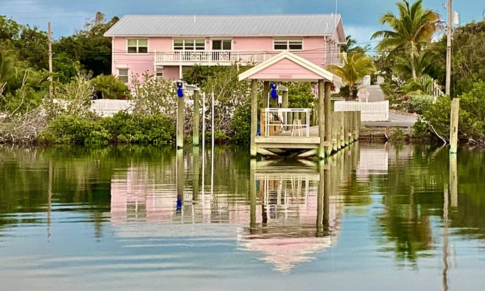 Treasure Cay House | Pink Bikini Island Cottage with a dock on Black Sound
