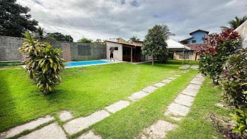 Manguinhos House | Piscina, Garagem, Praia e Conforto em Manguinhos