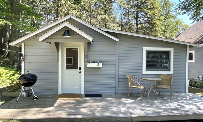 Honor Cottage | Platte Lake Waterfront Cottage with beach and swimming dock