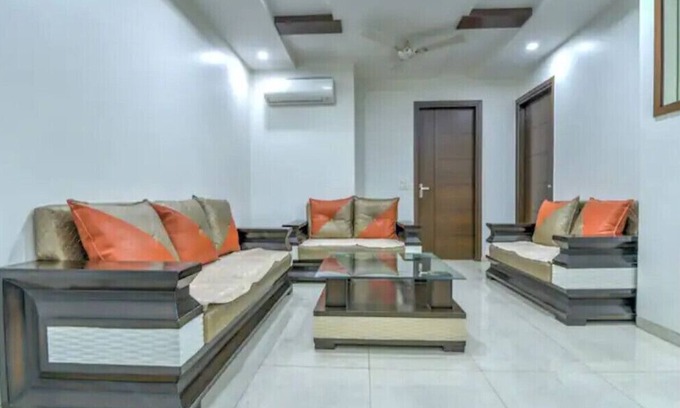 Block E Apartment | Pleasant 3BHK Apartment Park Facing, Close to Market By HostMyStay