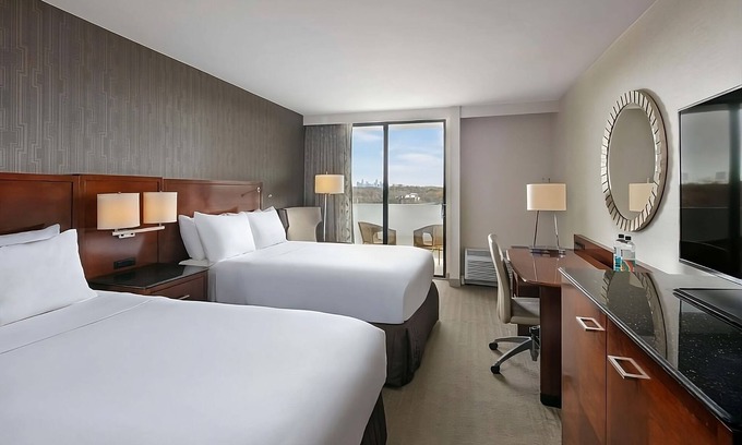 Executive Park Hotel | Pleasant Stay, Convenient Location! Parking, Pools! Near Mint Museum of Art