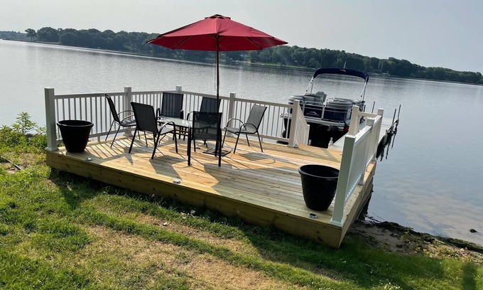 Norton Shores House | PONTOON BOAT NOW INCLUDED! KAYAKS! Waterfront Cottage on Mona Lake with HOT TUB!