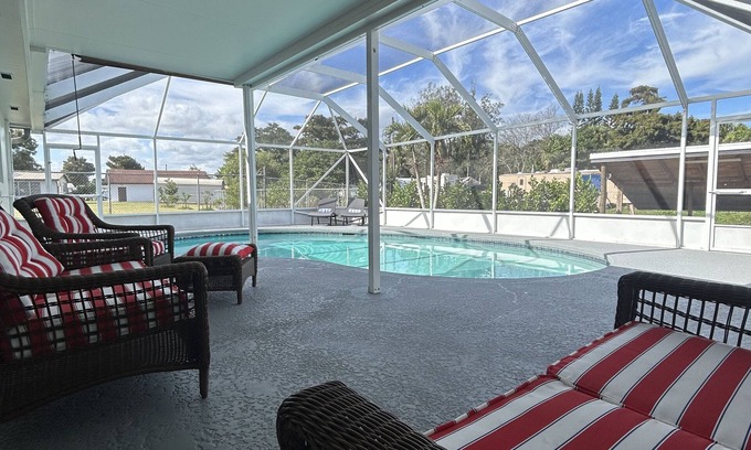 Taylor Creek House | Pool house with lake access
