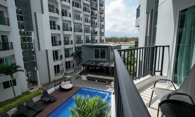 Rayong Condo | Pool view balcony 1 bdrm, modern style w Wi-Fi and AC near the beach