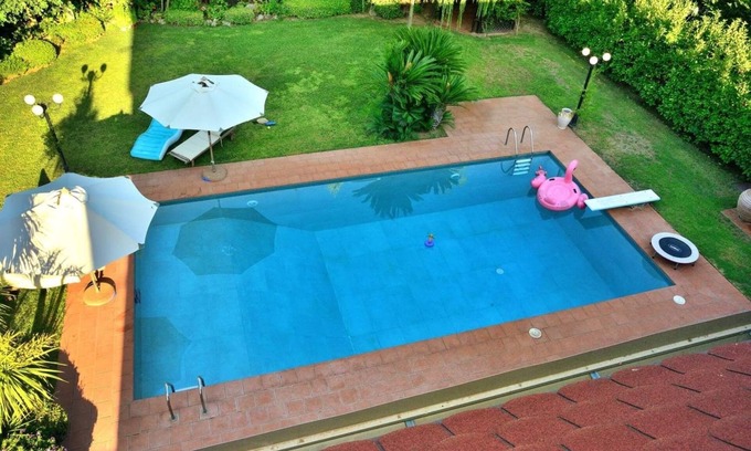 Skala Oropou Villa | Pool Villa DesmiranDive in the pleasure and relax by the pool, close to the sea.