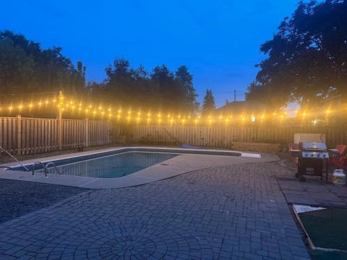 Brampton West Villa | Poolside Retreat with Private Patio