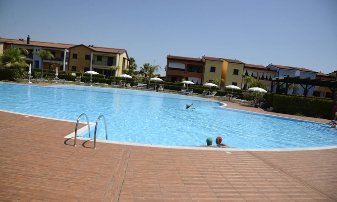 Lido Condo | POSEIDONE-Refined apartments in village with swimming pool