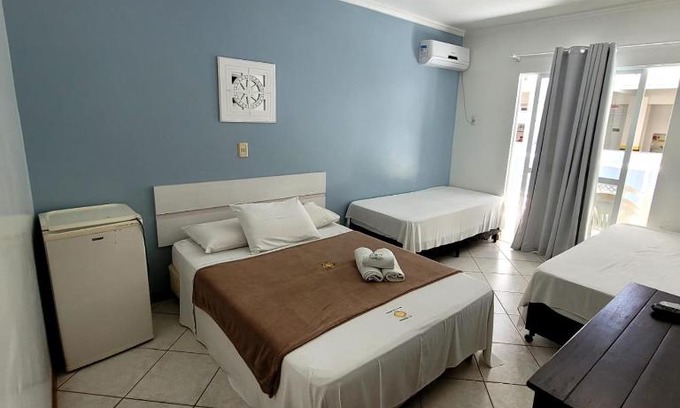 Centro Cabin | Pousada Rota do Sol Bombinhas suítes com café e sem limpeza diaria