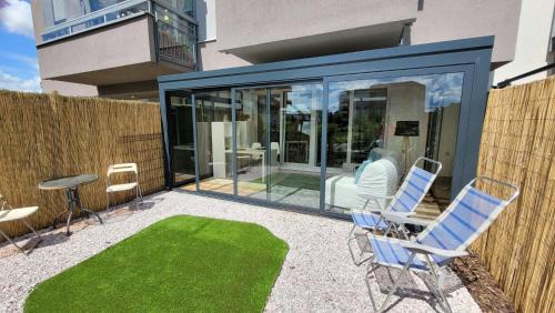 Letnany Apartment | Praha Letňany, zimní zahrada, parkování v garáži zdarma