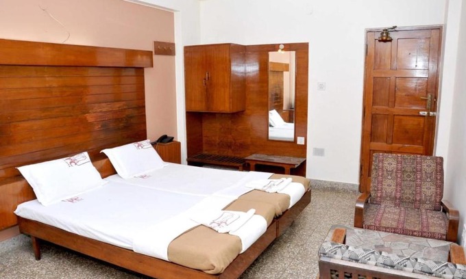 Gandhi Nagar Hotel | PRANAM COMFORTS LODGE