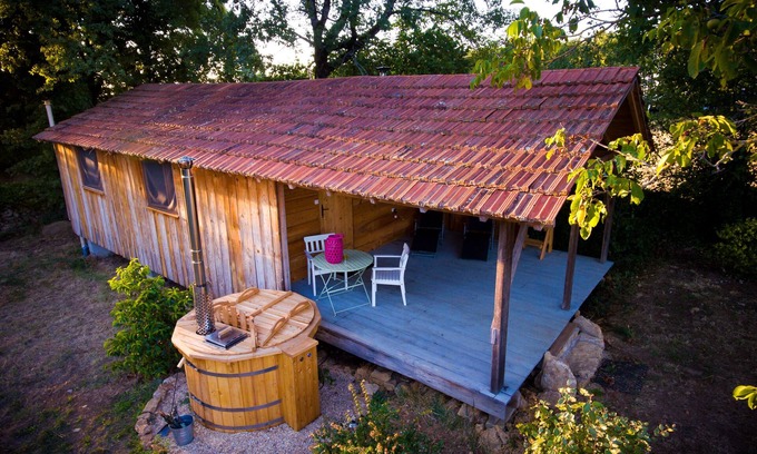 Espinas Cabin | Pretty cabin in beautiful gardens with wood stove & Nordic spa hot-tub/jacuzzi.