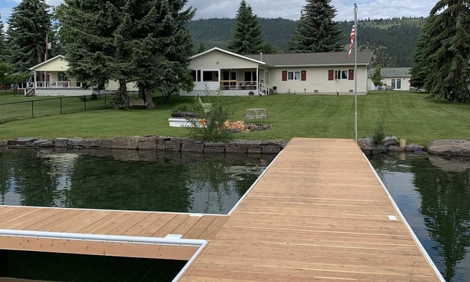 Big Arm House | Prime Lakefront home w/guest house - extra charge, dock, firepit, large yard
