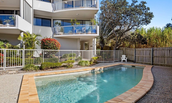 Sunrise Beach Apartment | Pristine 2-Bed Apartment with Pool and Balcony