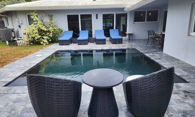 Coral Ridge House | Pristine and Modern Bayview Bungalow With Heated Pool!