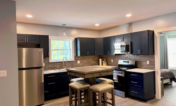 Palmyra Apartment | Pristine upscale 2 bedroom duplex unit surrounded by forest.
