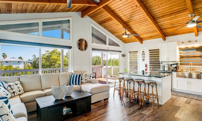Port Pine Heights House | Pristine Waterfront Charmer - Outdoor Living & Dining, Dock, AC - Snowbirds OK
